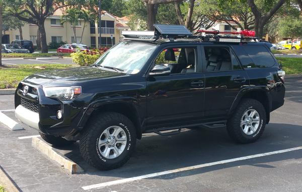 fargo4x4-albums-%23fargo4x4-picture32783-solar-panel-tilted-hi-lift-jack-mounted.jpg