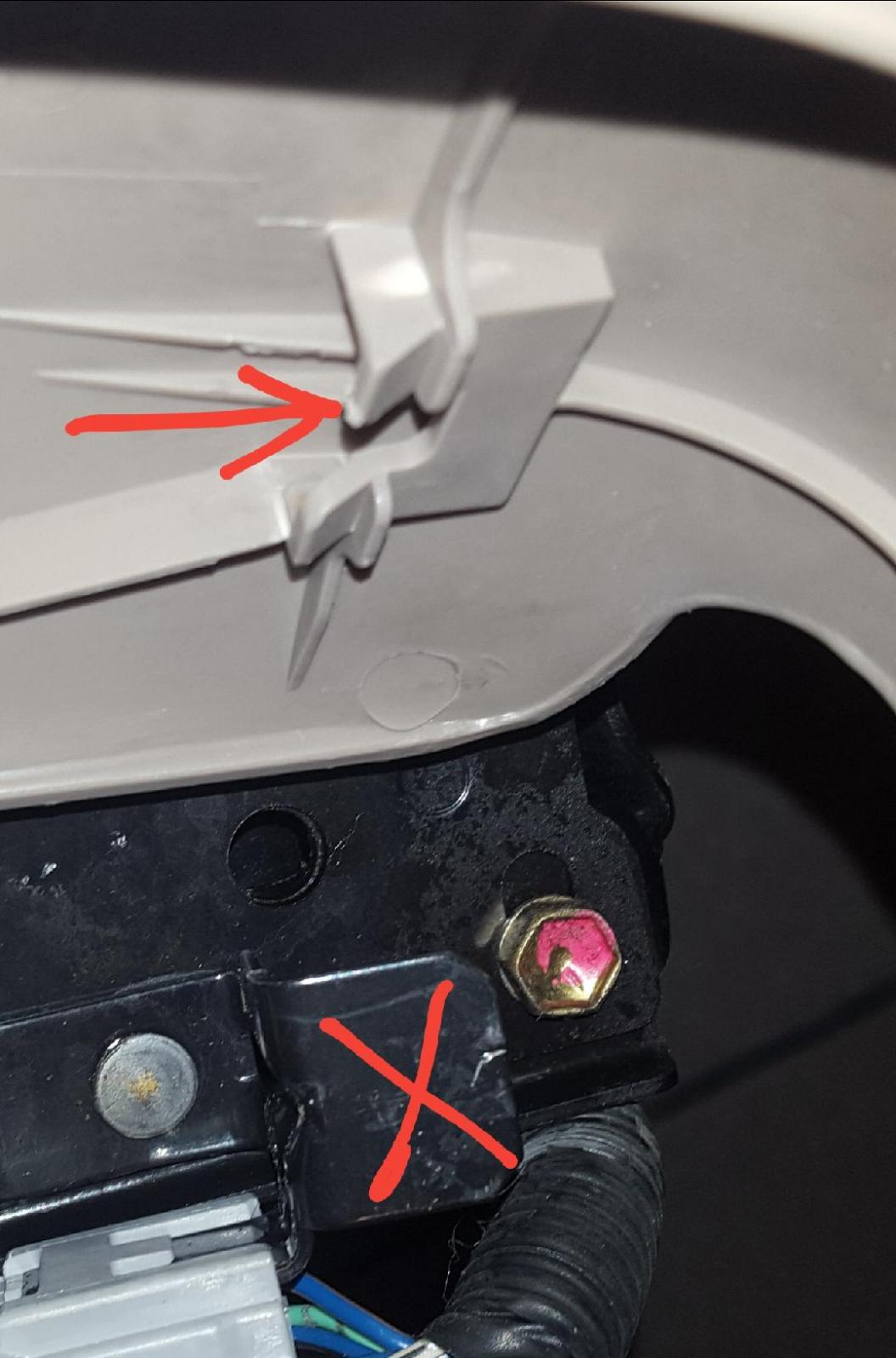 How does the plastic seat shield that holds the power seat buttons attach?-thumbnail-65-jpg