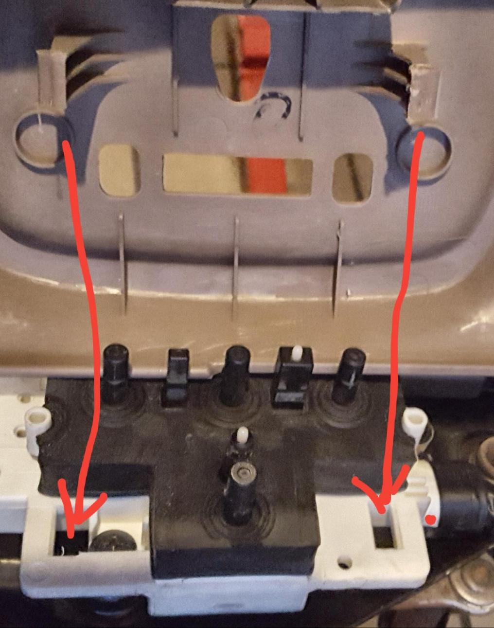 How does the plastic seat shield that holds the power seat buttons attach?-thumbnail-66-jpg