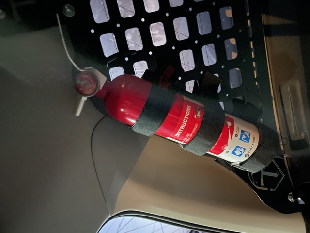 Fire extinguisher on a molle panel. Is it safe?-391d0fcd-6859-4e20-b6b3-b5e4b8c61f16-jpeg