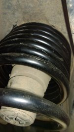 driver rear coil in bucket.jpg