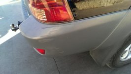 rear bump damage.jpg