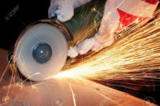 13716542-worker-cutting-metal-with-grinder.jpg