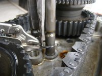 4runner_xfer1_Grab the circlip with a vicegrip and use a large screwdriver to pry the pliers bac.jpg
