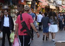 491984226-young-israelis-carry-their-personal-rifles-at-the.jpg.CROP.promo-xlarge2.jpg