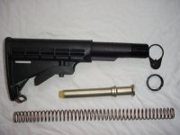 bushmaster post ban non collapsible tele stock a.jpg