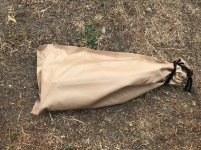 pegs and guy lines in bag.jpg
