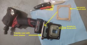 Transfer shift lever gasket and oil deflector.jpg