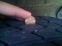 Tire with coin.jpg