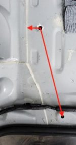 Hidden threaded hole, driver's side.jpg