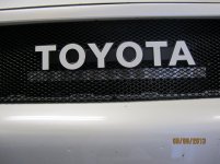 behind the logo light mount off.jpg