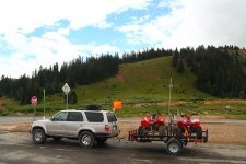 4Runner with atvs on trailer at berthoud pass.JPG