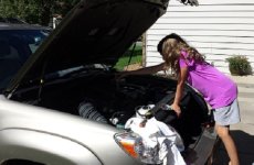 Kidfixingcar.jpg