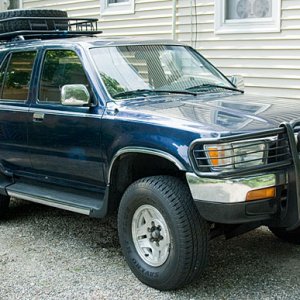 The truck didn't come with a spare tire & I'm not a big fan of under vehicle spares. So I purchased a used rim & tire & mounted it up on my roof rack 