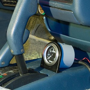 I install a vacuum gauge to keep an eye on how hard my 3.slo is working. The enclosure is a spray paint can lid. High tech I know.