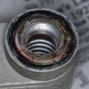 Outlet side of cooler, exhibiting the samecorrosion as the fitting. O-ring doesn't look so good, showing contamination at the interface where the rubb