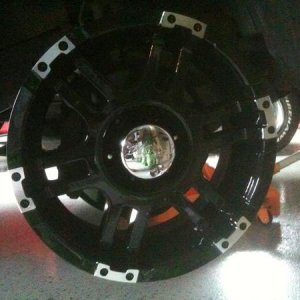 here is a pic of the 18X9 ULTRA WHEEL THUNDER WHEEL with a 12mm offset... forgot to take a pic of the tires... they are 285/65r18 NITTO TERRA GRAPPLER