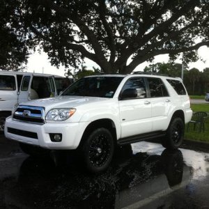 3 inch revtek lift, 20 inch black xd hoss wheels wrapped in nitto terra grapplers