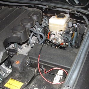 red/black taped cable inside engine compartment