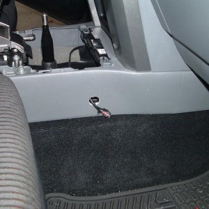Mounting hole with cable sticking out