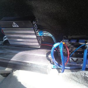shitty camera phone pic. both amps/power cell/0 gauge wiring