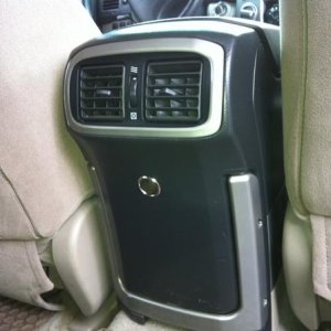 12V install - rear of center console
My kids love this.....lets them charge their itouchs during long rides