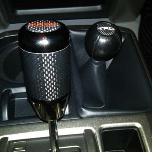TRD leather transfer case shifter
Razo 400g carbon fiber shift knob