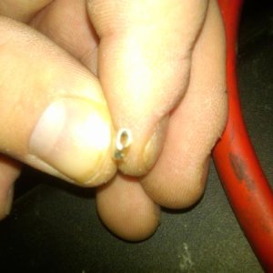 Crimped spayed connector to fit on the post. Work in increments, making sure the connector is TIGHT on the post
