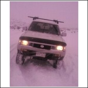 Snow wheeling up Signal Peak near Gunnison, CO