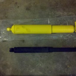 Side by side of the old stabilizer (black) and new Old Man Emu (yellow). The stock one was shot.
