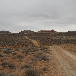 On the way to Tusher Tunnel, with the Monitor and Merrimac Buttes in the distance (named after the ironclad warships of the "Civil" War)