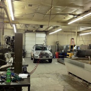 Inside Ricochet, getting the skid fitted