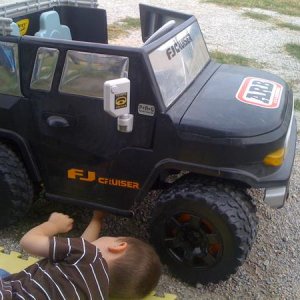 That is my 3yr old changing his transfer case fluid as I was doing my own