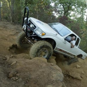 My other truck
2000 Tacoma Dana 60 F/R 5.38 Gears, locks...full hydro steering, 42" Irocks, Rocktek EVERYTHING, 
RIP Super Taco