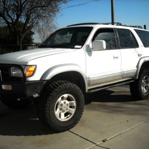 315s....need a small body lift to stop the rubbin.
