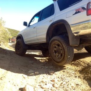 Dealing with the huge ruts everywhere.. Yes my tire is not touching the ground.