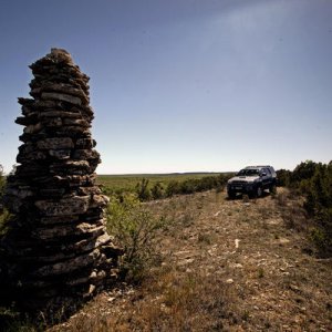 This stack of rocks on private property in West Texas is known as a "water monument." High upon a hill sits this 8-foot tall stack of rocks for the pu