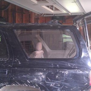IMAG0394. New rear lexan window and custom 1/8x 1inch  steel window frame.