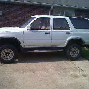 Here she is with just a little primer to cover the ugliness until I could get started rust proofing.