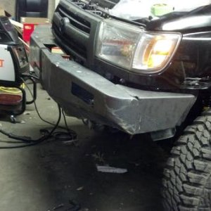 WORKING ON MODIFING FRONT TJM BUMPER OFF MY 93 RUNNER