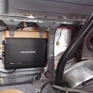 6x9's dedicated amp custom located behind panels