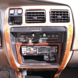 The peeling wood trim...thinking of options to fix...maybe just peel all of the top layer and re-coat the wood?