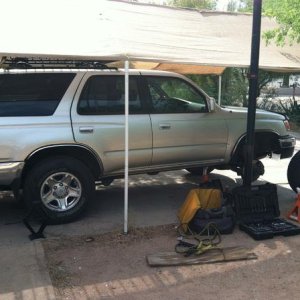 Installing coilovers.