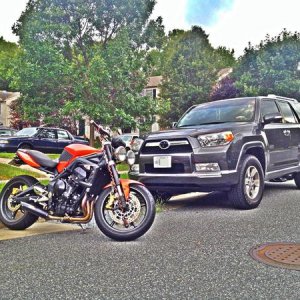 My 2 loves.. '09 Triumph Street Triple R in Blazing Orange and '12 Toyota 4Runner SR5 in Magnetic Gray