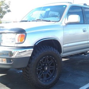 One month after...
Fixed any minor dings and scratches
Dropped running boards
Wheels & Treads
  17x8 ProComp 7005
  BFG 265x70R17 KM2 (No Lift, No Rub