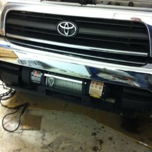 Winch in, the control box is right behind the bumper.