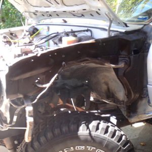 Time to start on the body work. Replaced the fenders with non-rusty ones and undercoated the metal behind it