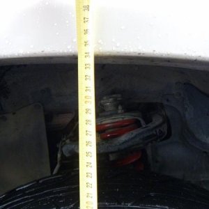 After front. Measured from top of rim.