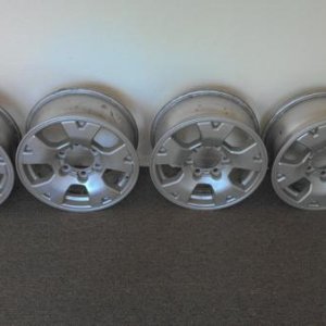 A set of Tacoma sport wheels that I stripped and re-finished with the intention of installing them on my '97 4runner.