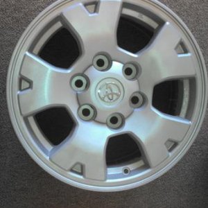 Refinished Tacoma sport wheel with center cap